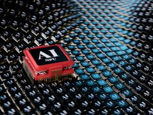 CorsiWeb.eu - Un microchip rosso con la dicitura AI NPU spicca tra molti microchip neri con la dicitura AI disposti a griglia.